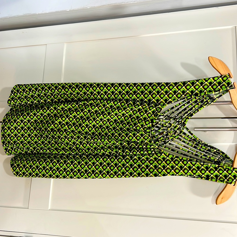 Green, yellow, brown, and black blouse